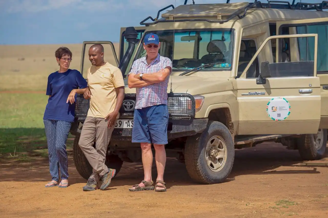 Tanzania Safari Experience 4x4 safari jeep during a Serengeti game drive across the open plains