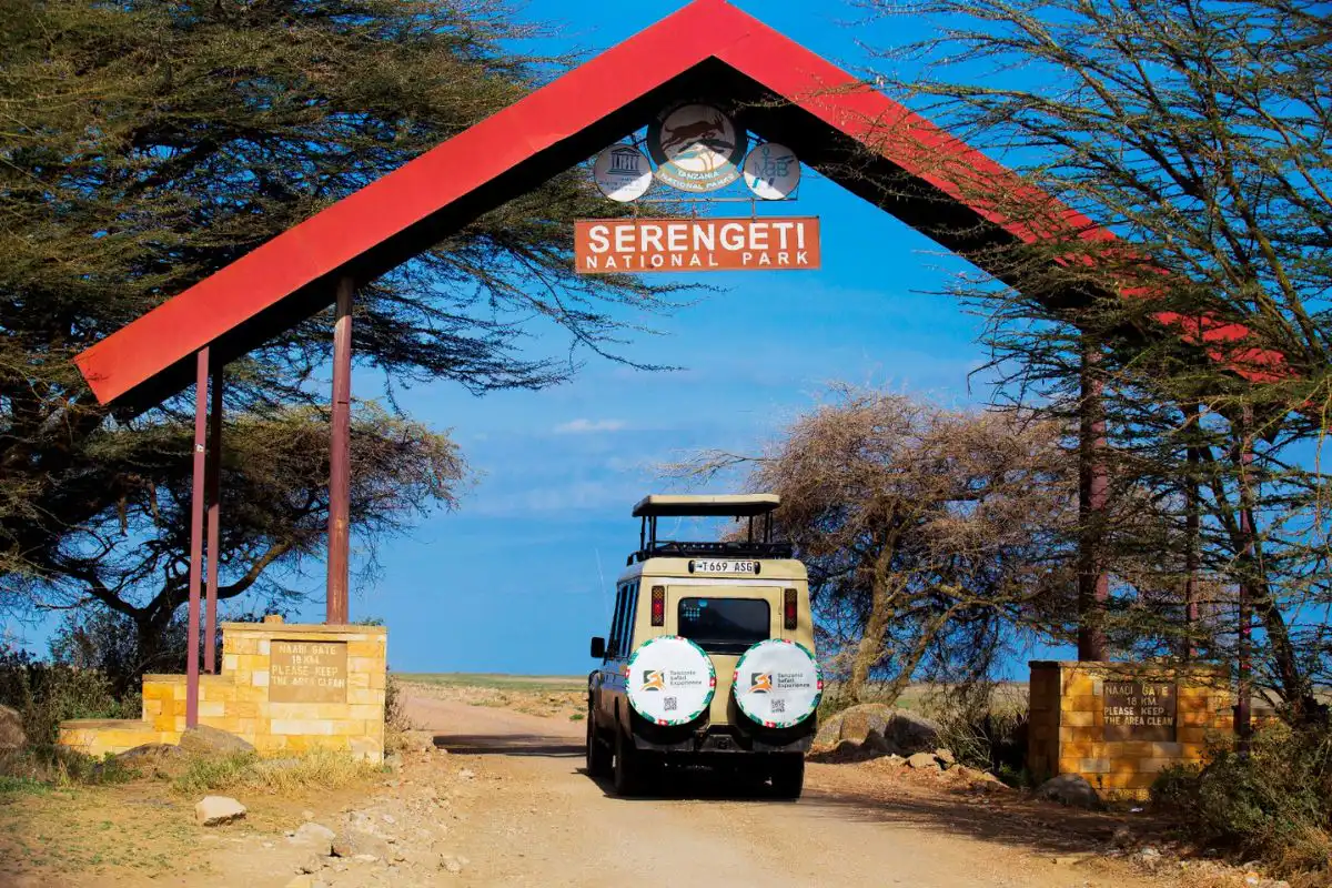 Safari jeep entering Serengeti National Park through Naabi Hill Gate